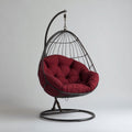 Fauteuil suspendu en acier noir avec coussin bordeaux